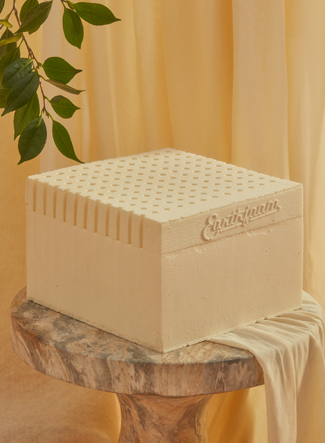 a block of foam on a pedestal 